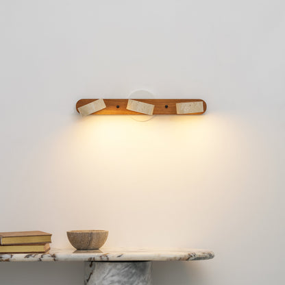 Travertine stone wall sconce by Moktan Sabai with dimmable LED and natural wood accent on Tampa Home & Garden Store