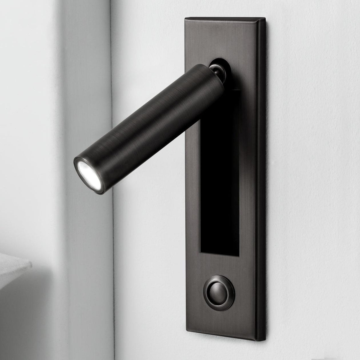 Recessed folding bedside wall sconce in dark matte black metal with warm LED and cylindrical head on Tampa Home & Garden Store
