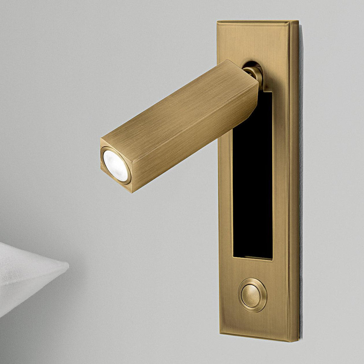 Brass recessed folding bedside wall sconce with warm LED, flush backplate on Tampa Home & Garden Store
