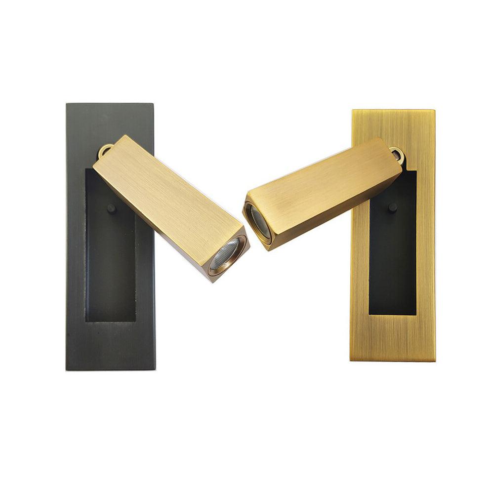 Recessed bedside wall sconce with warm LED brass heads on dark backplates on Tampa Home & Garden Store