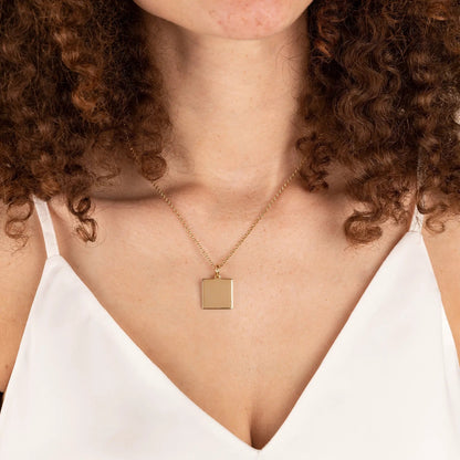 Gold-tone square pendant necklace on a delicate 21in chain on Tampa Home & Garden Store