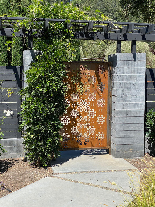 Outdoor privacy panel by Rustica Ornamentals, 46-inch rusted steel gate with cutwork pattern on Tampa Home & Garden Store