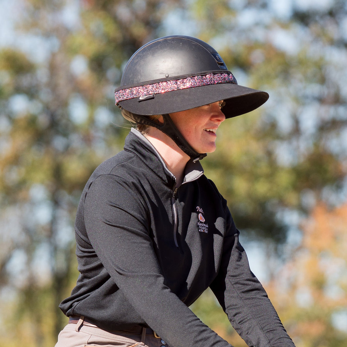 EquiVisor Original Shorty 3in Glitz sun visor on a black helmet with glitter band on Tampa Home & Garden Store