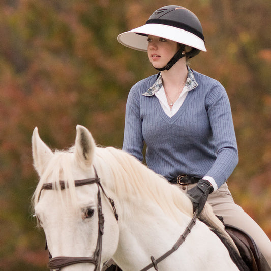 EquiVisor Sport sun visor on horseback rider with white brim and black crown on Tampa Home & Garden Store