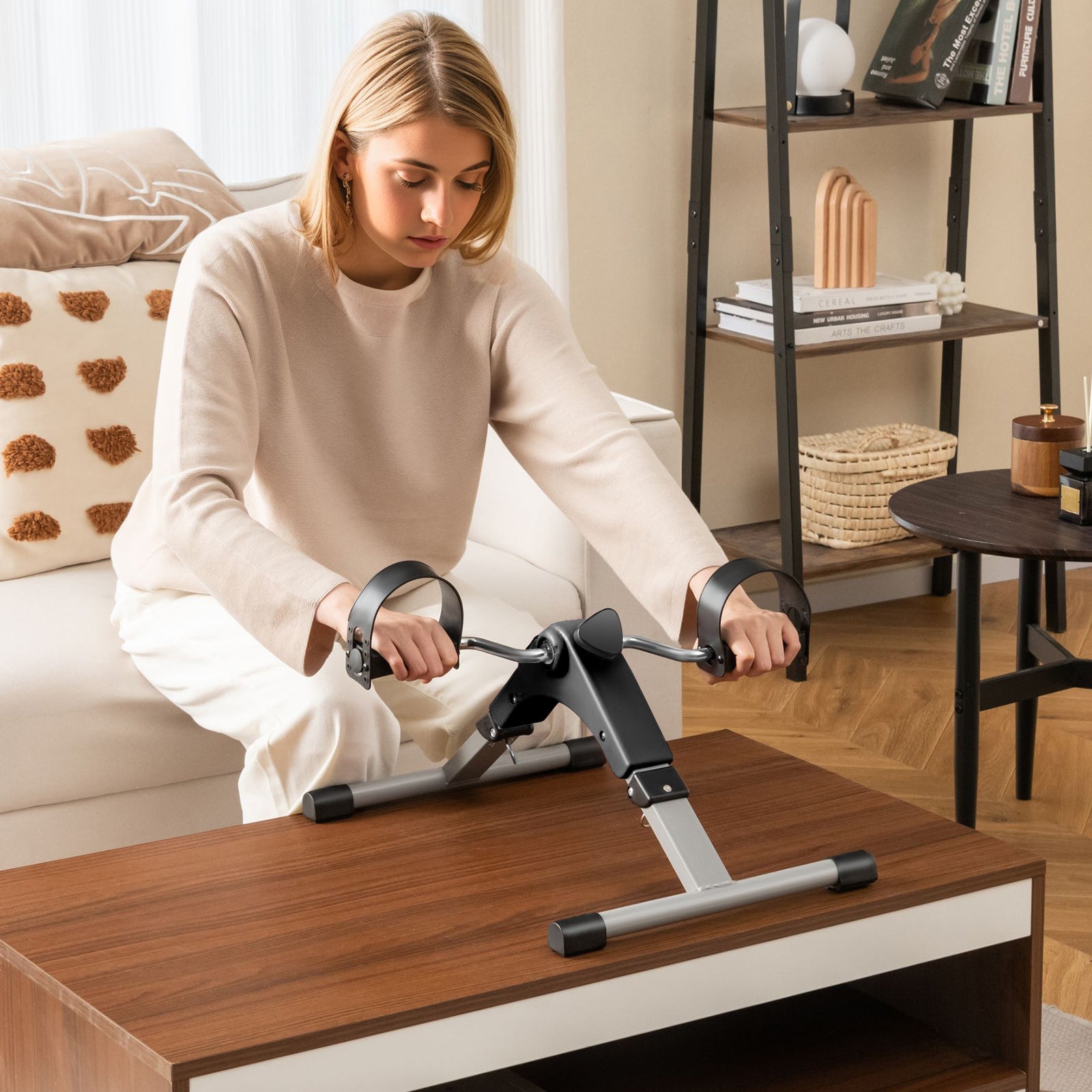 Under Desk Pedal Exerciser by DirectDeals with LCD display for arms and legs on wooden table on Tampa Home & Garden Store