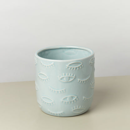 Eyes Pot 7 Inch ceramic planter in pale blue with embossed eye motifs on Tampa Home & Garden Store