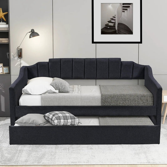 Black upholstered twin daybed with trundle in a modern bedroom with white/gray bedding on Tampa Home & Garden Store
