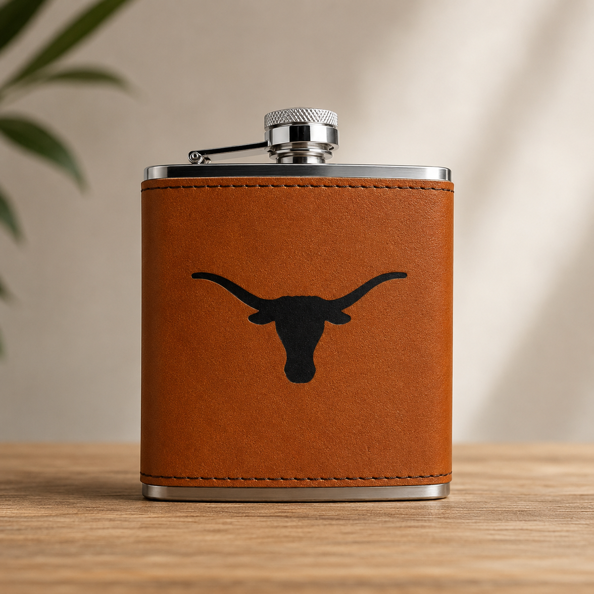 Texas Longhorns Leather Flask with tan leather wrap, black longhorn silhouette, silver cap on Tampa Home & Garden Store