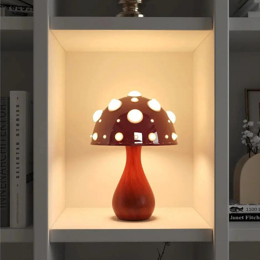 Mushroom Desk Lamp With Dimming Night Light, red wooden stem and mushroom shade on shelf on Tampa Home & Garden Store