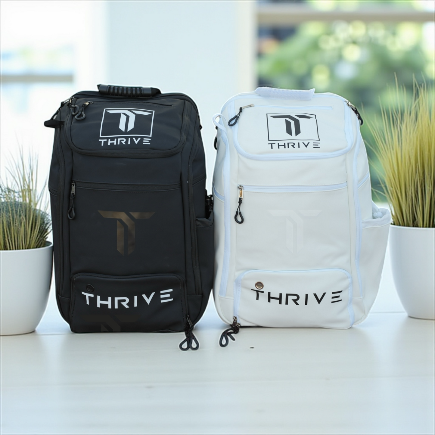 Thrive Elite Hybrid Tour Backpacks, black and white two-pack pickleball bags by Thrive on Tampa Home & Garden Store