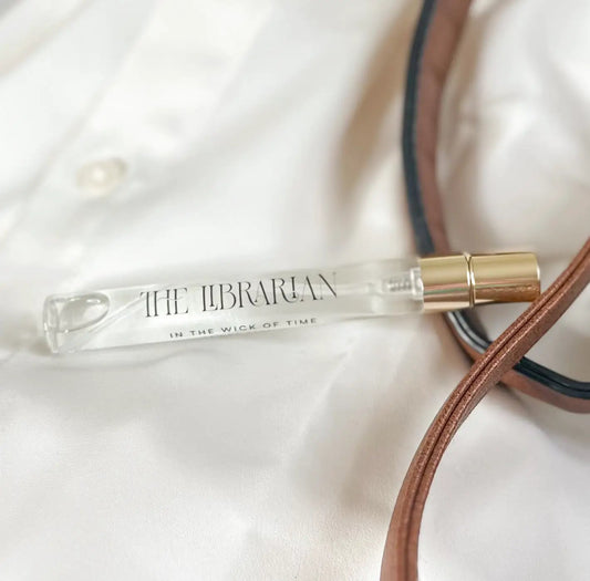 Perfume The Librarian clear glass bottle with gold cap In the Wick of Time leather strap on Tampa Home & Garden Store