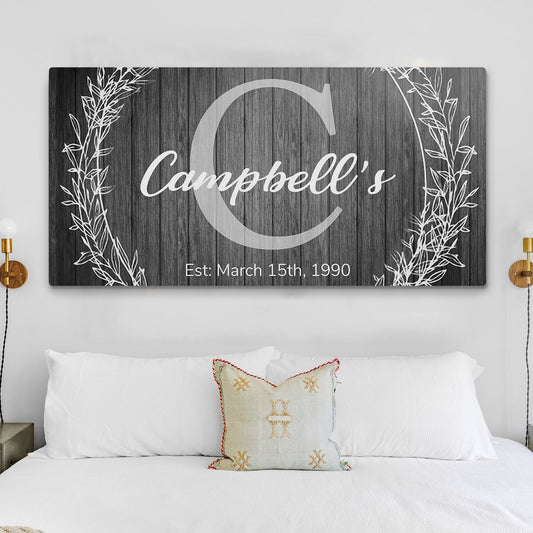 Family Name Sign Canvas with dark wood planks, large white monogram C and Campbell's script on Tampa Home & Garden Store