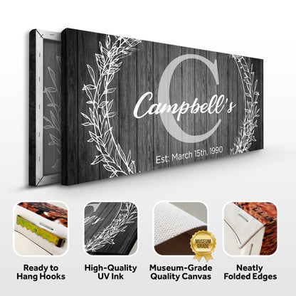 Family Name Sign canvas with monogram on dark wood with white botanical vines Tailored Canvases on Tampa Home & Garden Store