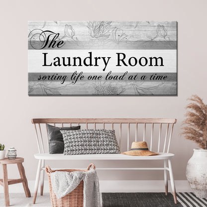 The Laundry Room canvas sign by Tailored Canvases with gray wood grain and floral outline on Tampa Home & Garden Store