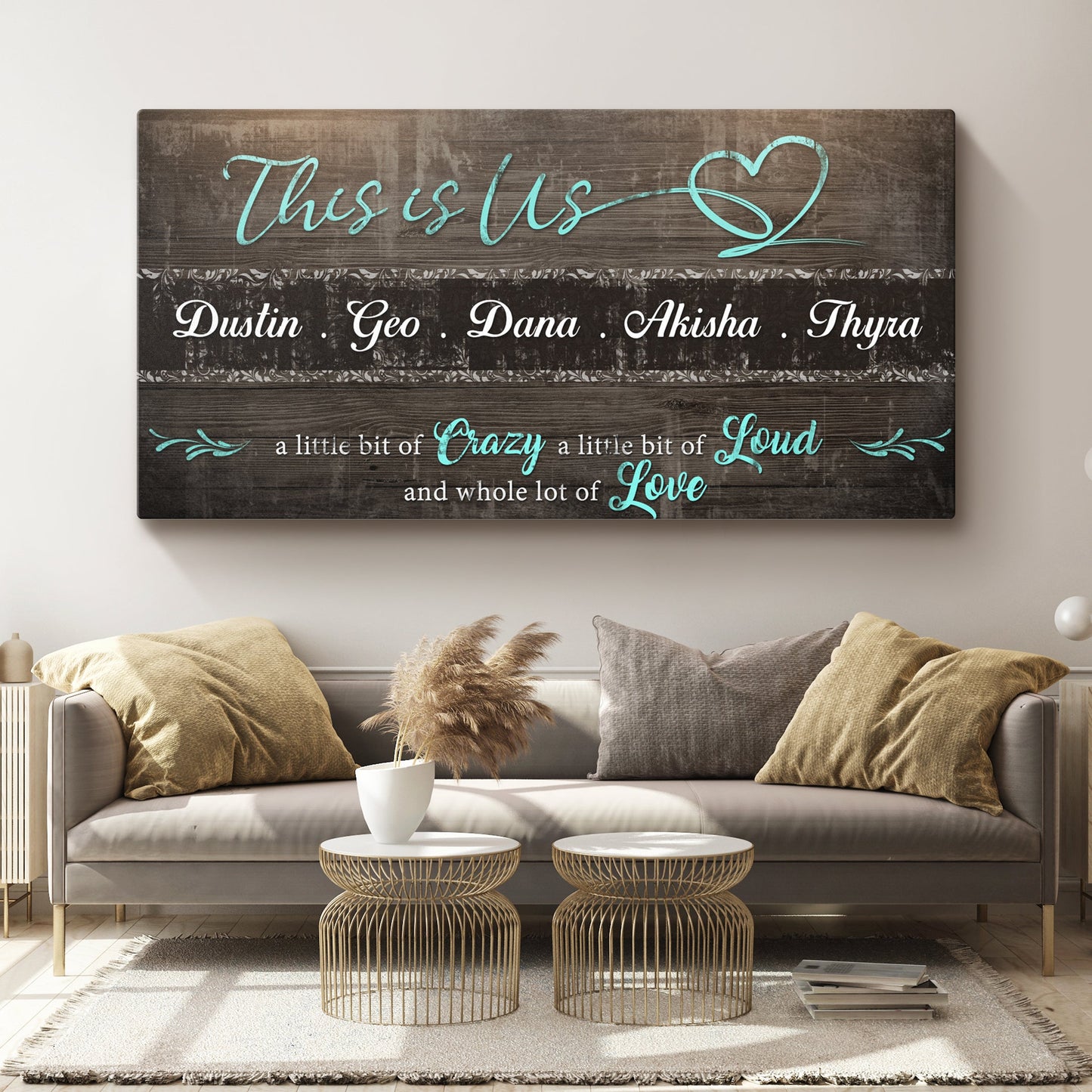 This is Us Family Sign canvas on dark wood with teal script and names Dustin Geo Dana Akisha Thyra on Tampa Home & Garden Store