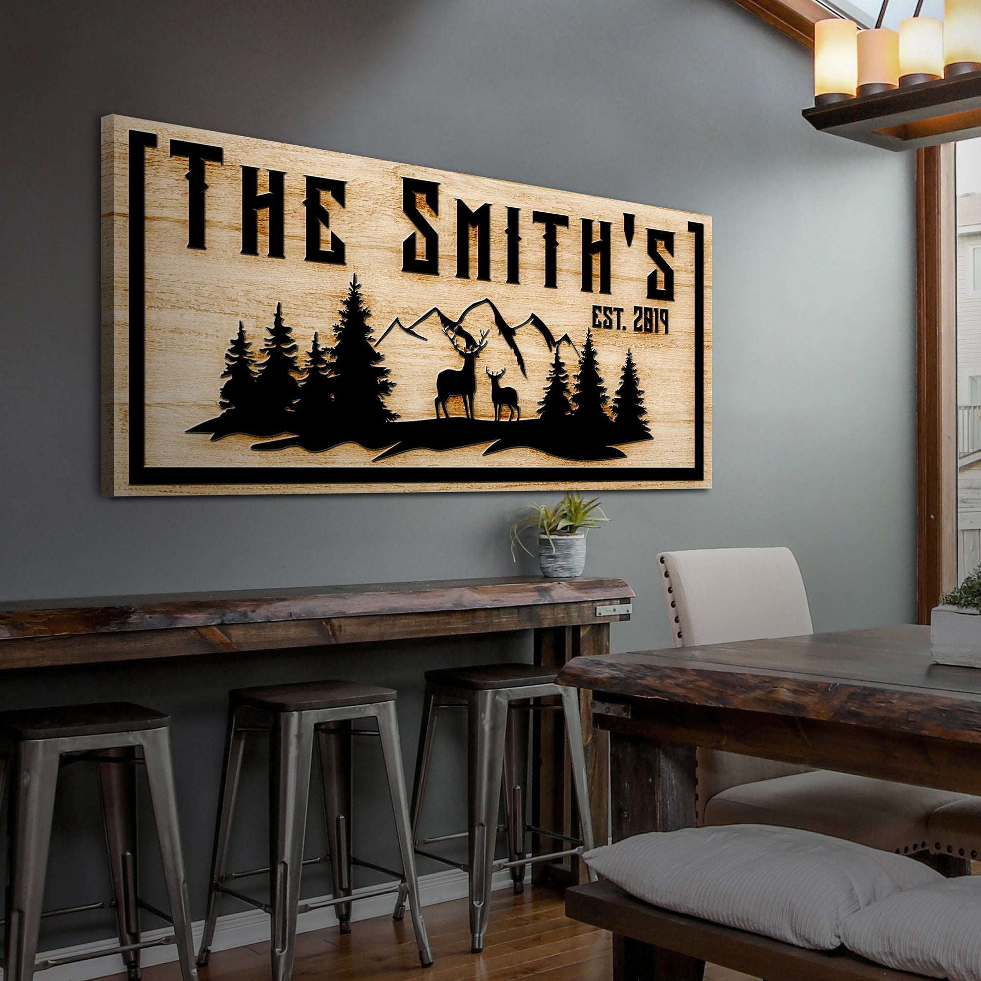 Family Mountain Sign Canvas by Tailored Canvases; natural wood grain with black deer silhouettes on Tampa Home & Garden Store