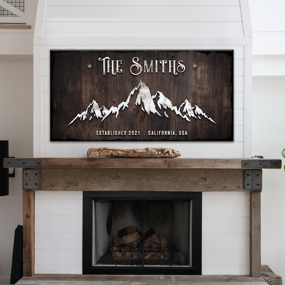 Family Mountain Home Sign canvas with dark wood background and white mountain silhouette on Tampa Home & Garden Store