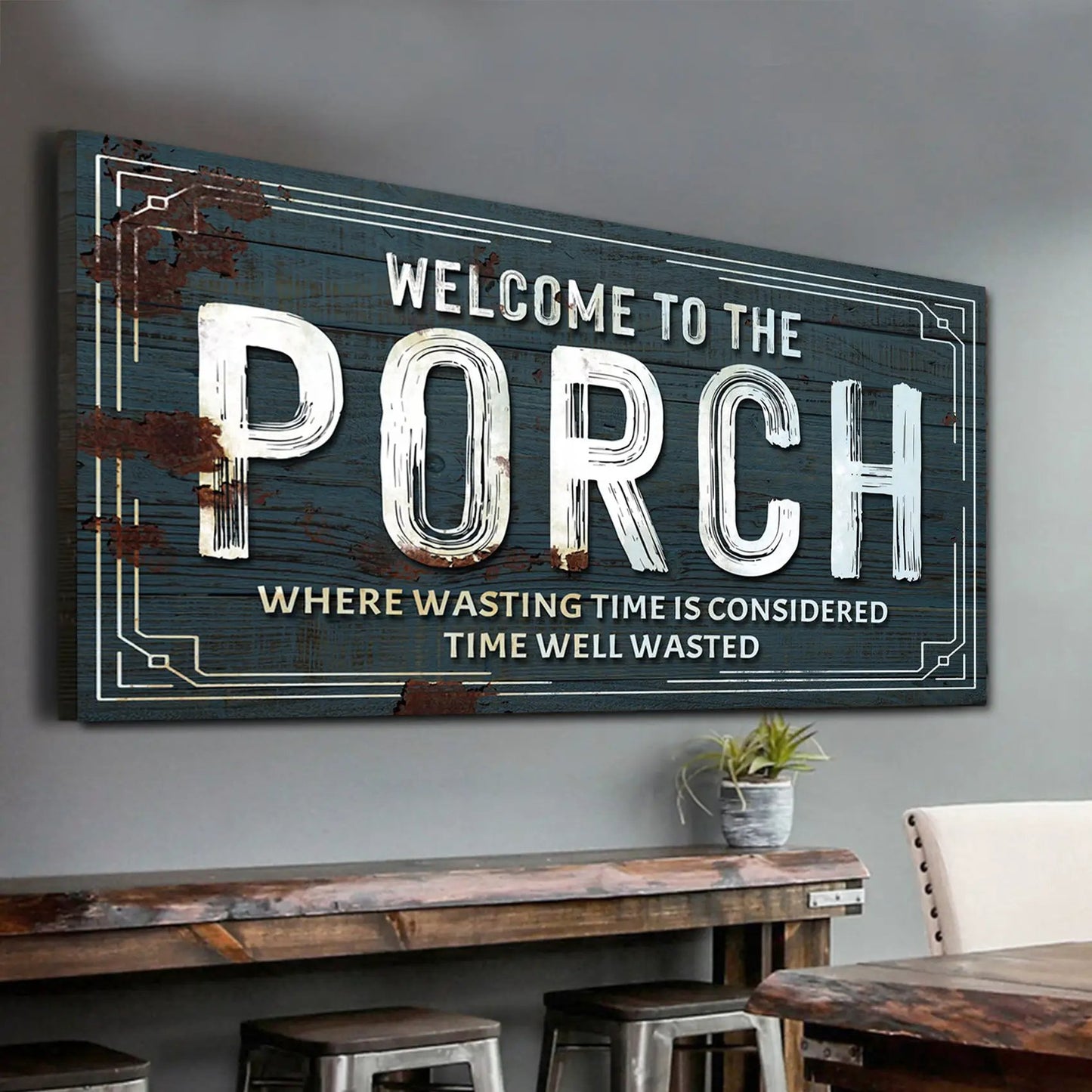 Welcome To The Porch Sign canvas with distressed blue wood and white lettering and rust accents on Tampa Home & Garden Store