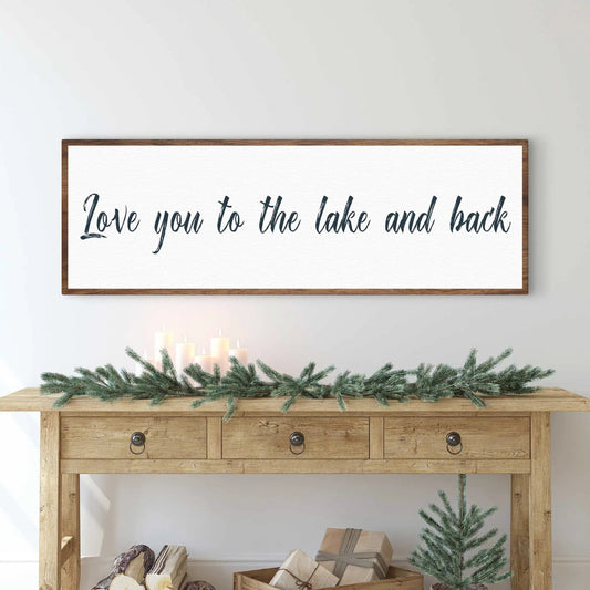 Love You To The Lake And Back Sign II canvas with brown frame and dark script on Tampa Home & Garden Store