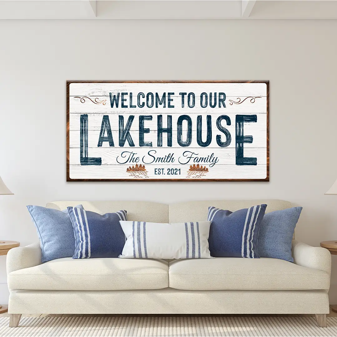 Welcome To Our Lakehouse Sign canvas with blue distressed lettering on whitewashed wood on Tampa Home & Garden Store