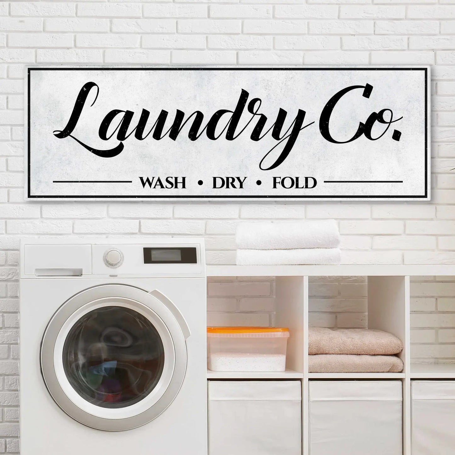 Laundry Co. canvas sign by Tailored Canvases with black frame and script WASH • DRY • FOLD on Tampa Home & Garden Store