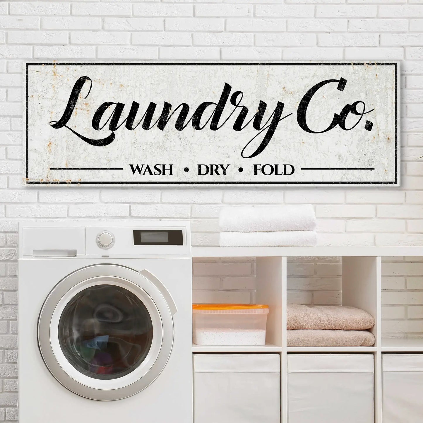 Laundry Co Wash Dry Fold Sign on rustic canvas by Tailored Canvases with black frame on Tampa Home & Garden Store
