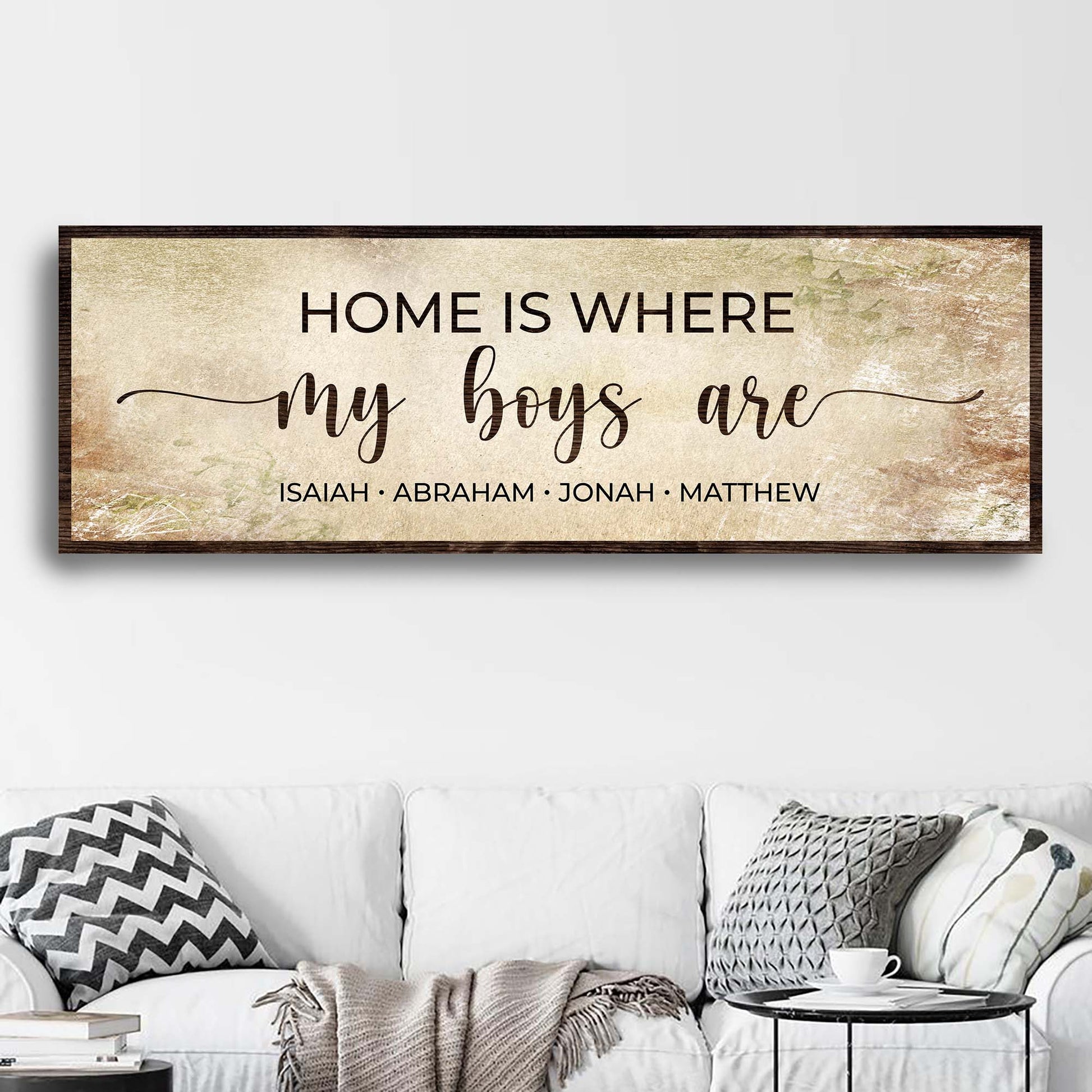 Wood-framed canvas sign with beige vintage backdrop reading Home Is Where My Boys Are on Tampa Home & Garden Store