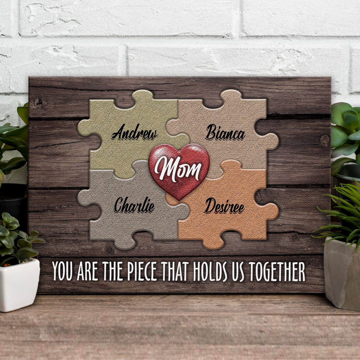Canvas puzzle sign with interlocking pieces and names, heart read Mom on wood backdrop on Tampa Home & Garden Store