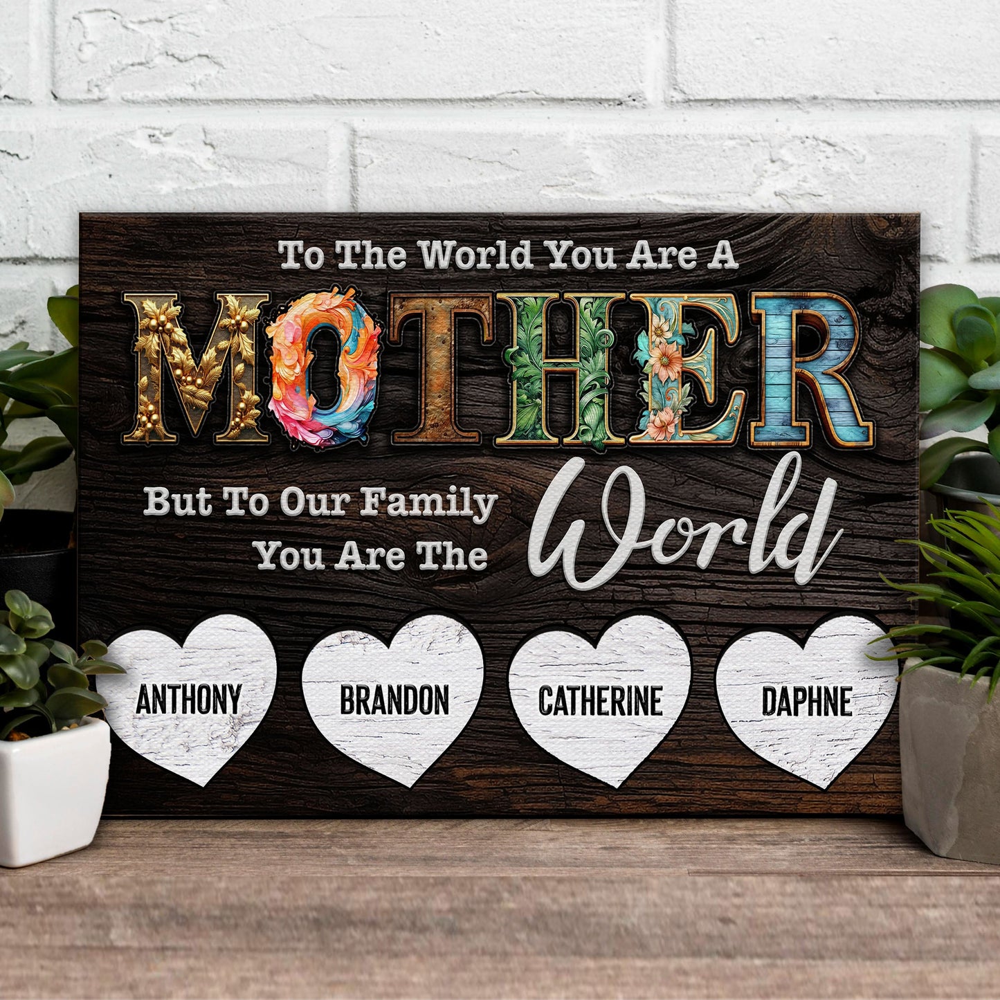 Mother's Day canvas sign by Tailored Canvases with floral MOM lettering on dark wood background on Tampa Home & Garden Store