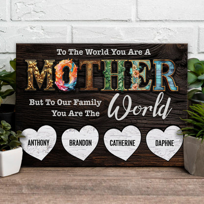Mother's Day canvas sign by Tailored Canvases with floral MOM lettering on dark wood background on Tampa Home & Garden Store
