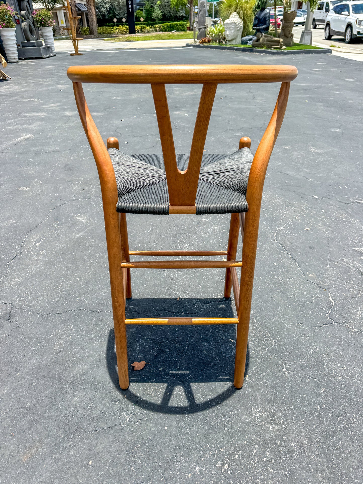 Wishbone Island Counter Stool, The Broward Design Center; warm wood frame, black woven seat on Tampa Home & Garden Store