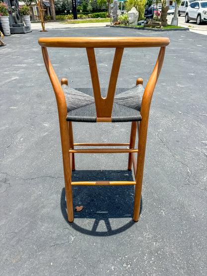 Wishbone Island Counter Stool, The Broward Design Center; warm wood frame, black woven seat on Tampa Home & Garden Store