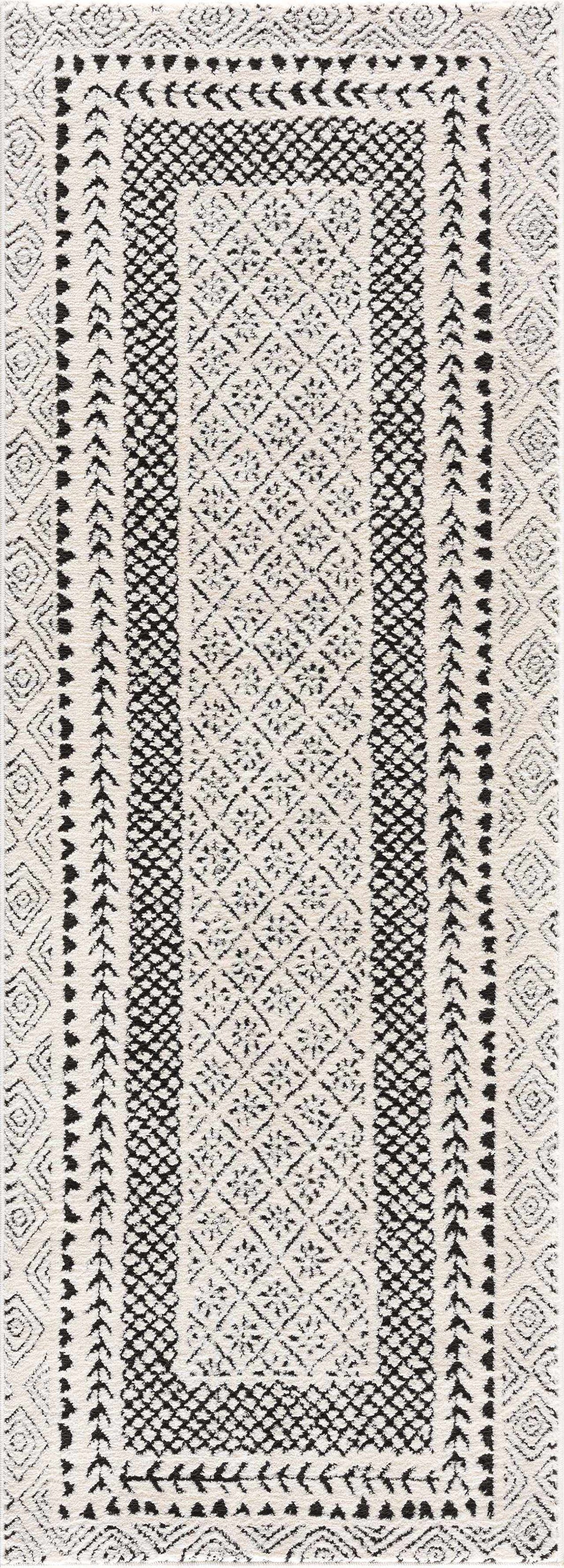 Julio Area Rug by Boutique Rugs in ivory cream with black geometric lattice border on Tampa Home & Garden Store