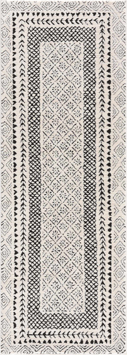 Julio Area Rug by Boutique Rugs in ivory cream with black geometric lattice border on Tampa Home & Garden Store