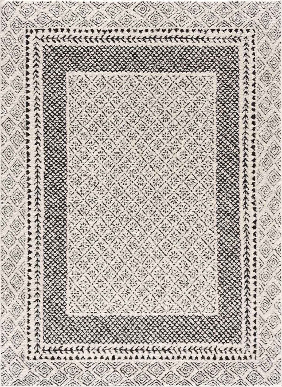 Julio Area Rug by Boutique Rugs in black and ivory with geometric lattice on Tampa Home & Garden Store