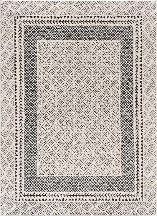 Julio Area Rug by Boutique Rugs in black and ivory with geometric lattice on Tampa Home & Garden Store