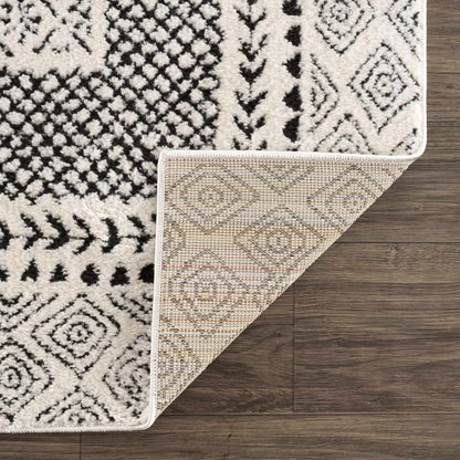 Julio area rug from Boutique Rugs, ivory and black geometric pattern, plush pile on Tampa Home & Garden Store