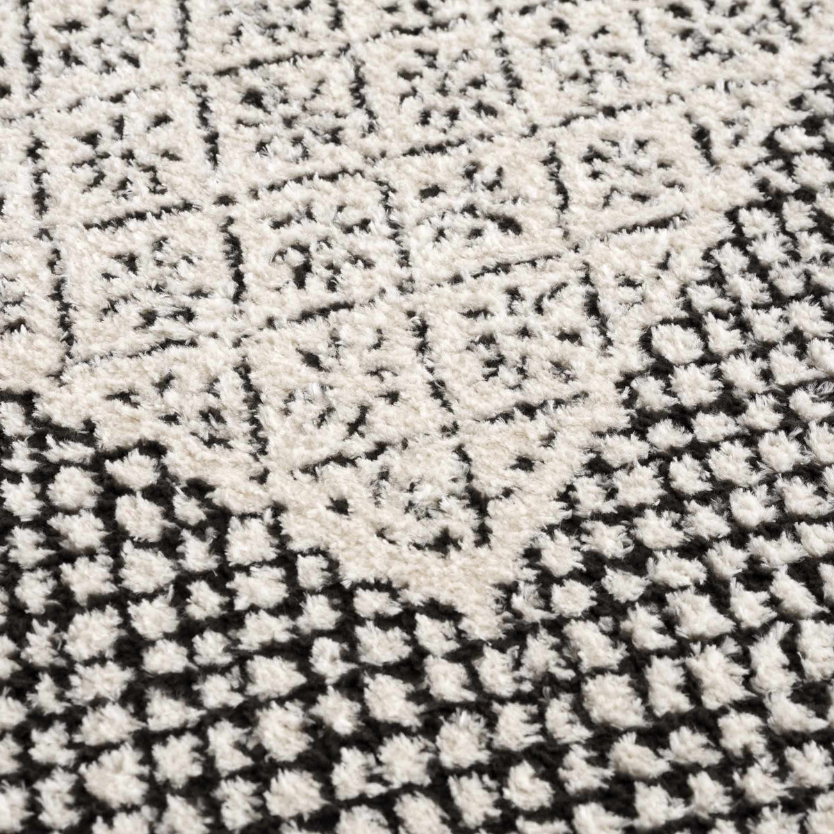 Julio Area Rug by Boutique Rugs with cream and black plush pile, geometric pattern on Tampa Home & Garden Store