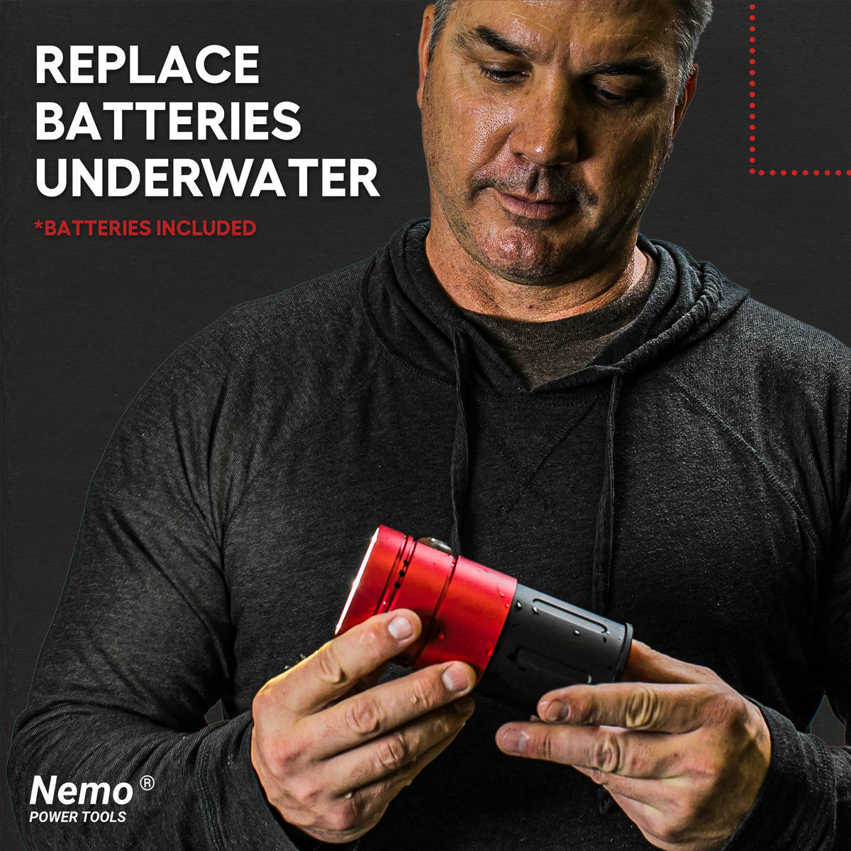 Nemo V3 flood light underwater power tool 15000lm red and black held by a man Nemo Tools logo on Tampa Home & Garden Store