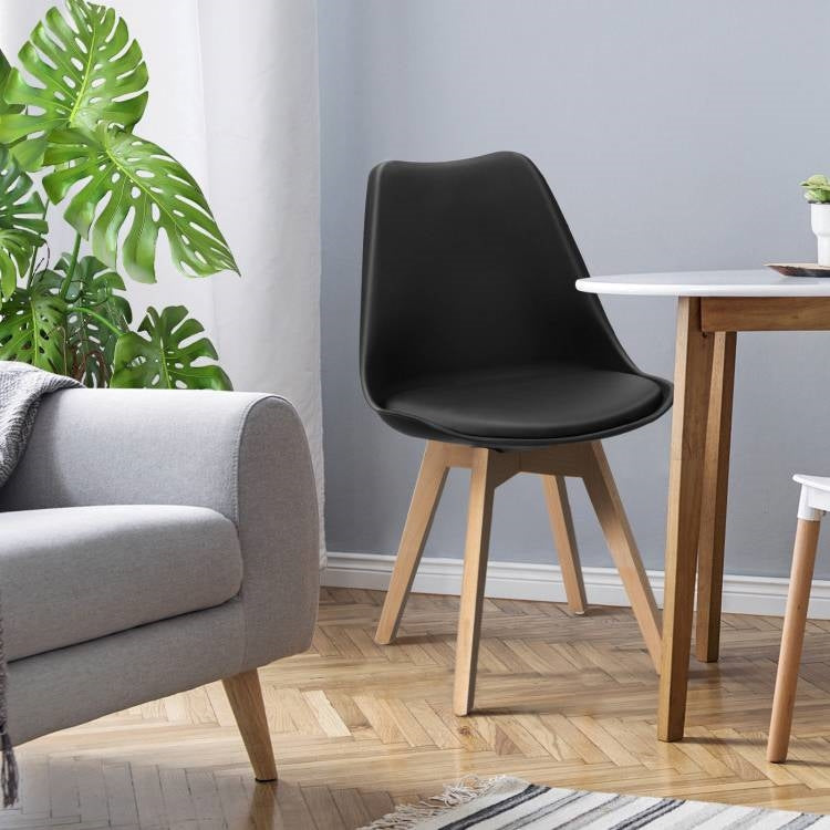 Juego de 4 sillas de comedor de cuero sintético negro con patas de madera, estilo moderno de mediados de siglo