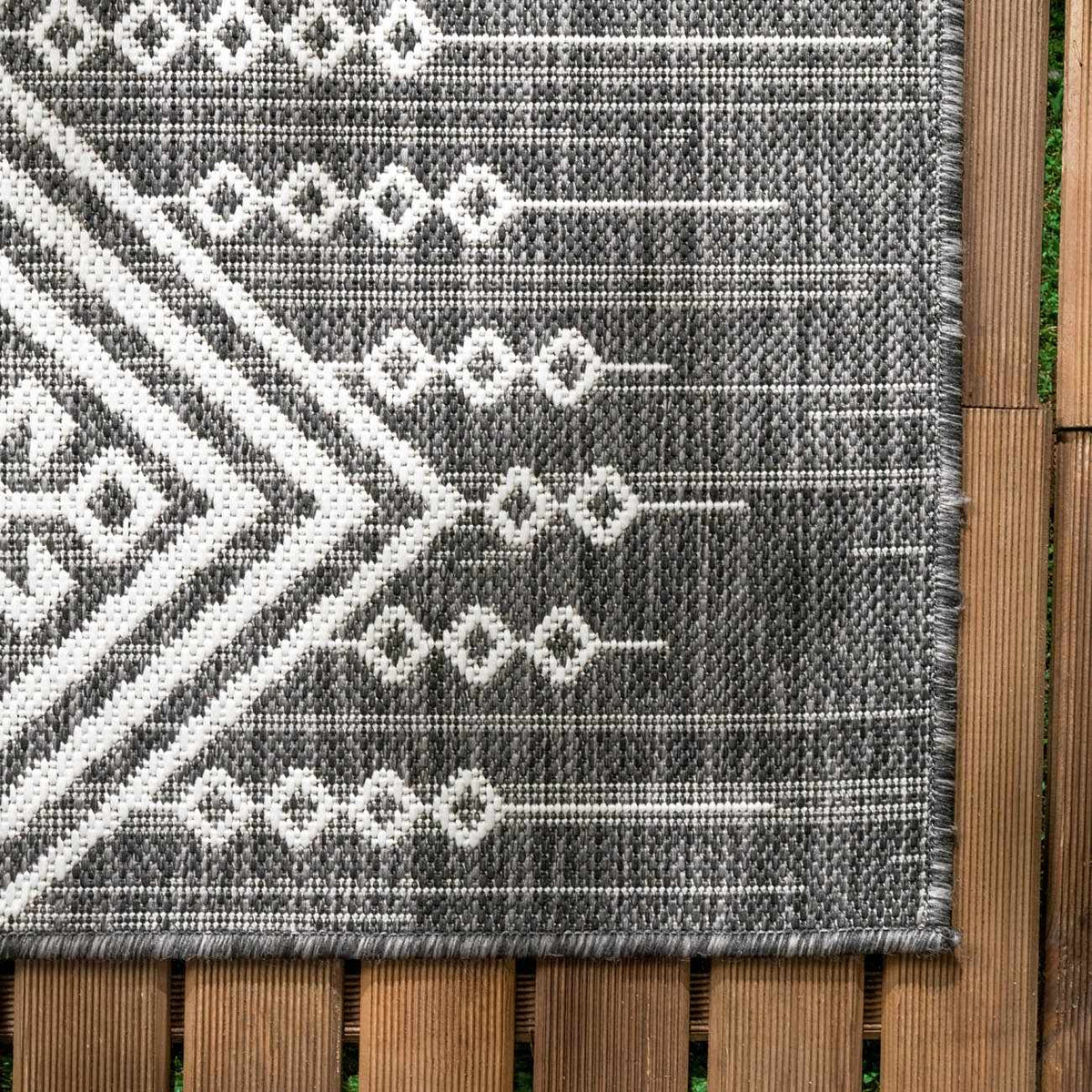 Frankville Black&White All Over Performance Outdoor Rug gray and white geometric pattern on deck on Tampa Home & Garden Store