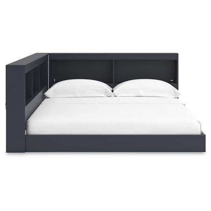 Cama de esquina de madera azul de tamaño completo con cabecero con estantería y puertos USB
