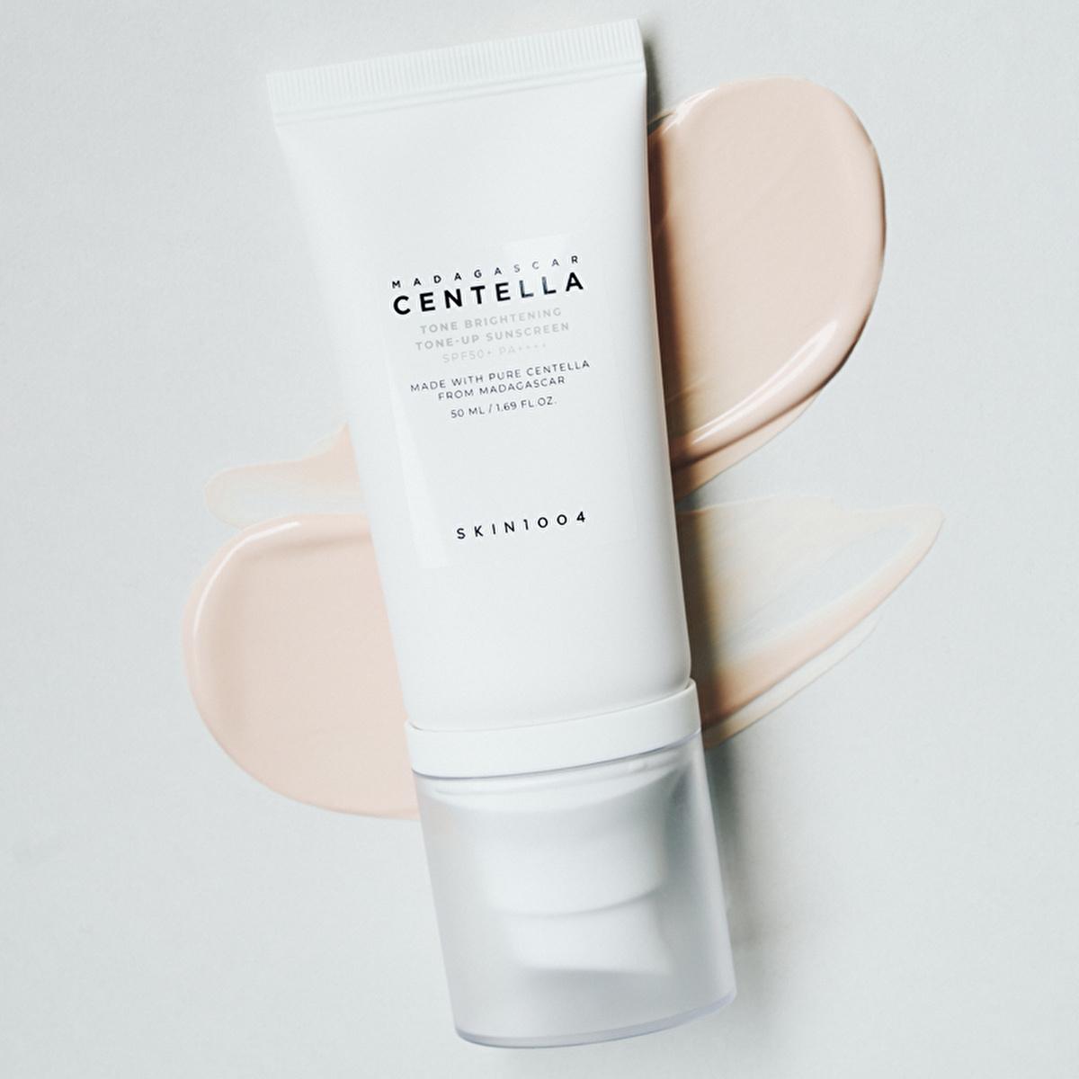 Skin1004 Madagascar Centella Sunscreen SPF 50+ PA++++ white tube with flip cap and peach swirls on Tampa Home & Garden Store