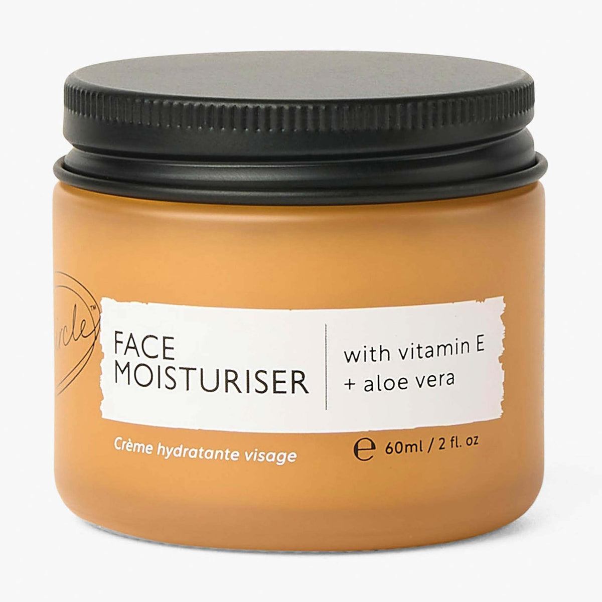Face moisturiser bottle with black screw cap and torn white label on orange container on Tampa Home & Garden Store