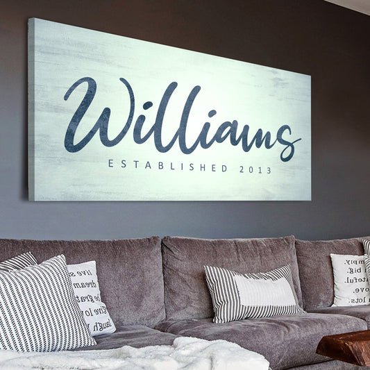 Family Name Sign V canvas by Tailored Canvases with Williams script on pale blue driftwood on Tampa Home & Garden Store