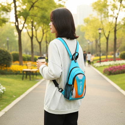 Women crossbody sling bag by Shaketea turquoise blue with orange panel worn as chest pack on Tampa Home & Garden Store