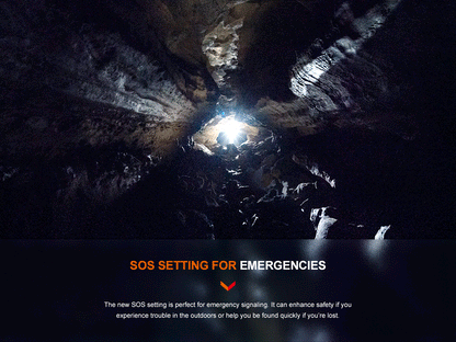 Fenix PD40R V3 rechargeable tactical flashlight beam illuminating a dark cave opening on Tampa Home & Garden Store