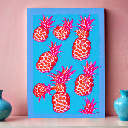 Canvas Print Fever Piña by Tailored Canvases; vivid pink pineapples on blue crafting canvas on Tampa Home & Garden Store