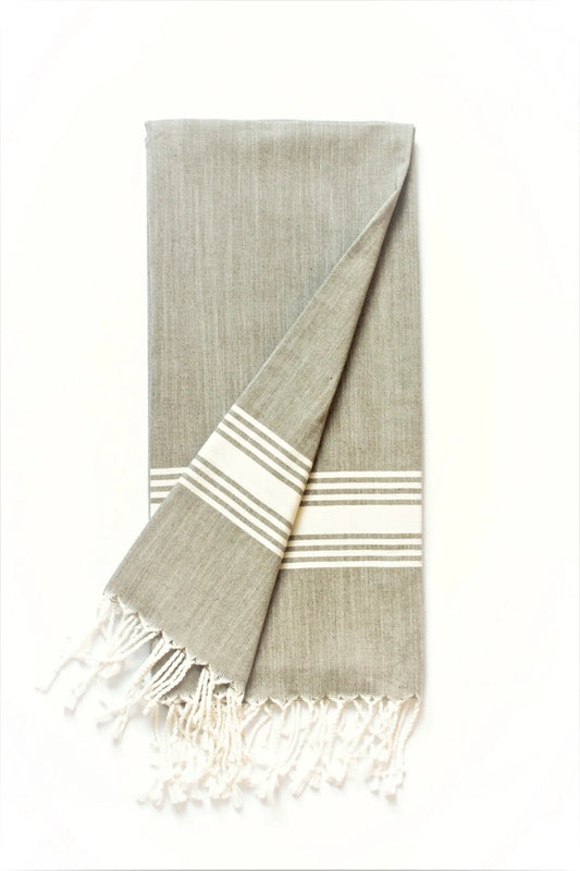 Figueres olive green and white beach towel by Beach House Towels with striped border and fringe on Tampa Home & Garden Store