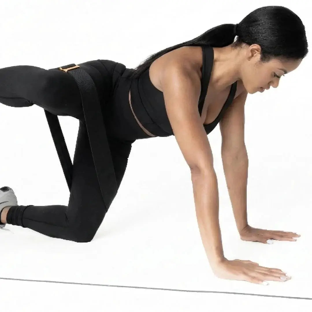 Black Aletha Health exercise band around thigh for lower-body resistance training on Tampa Home & Garden Store